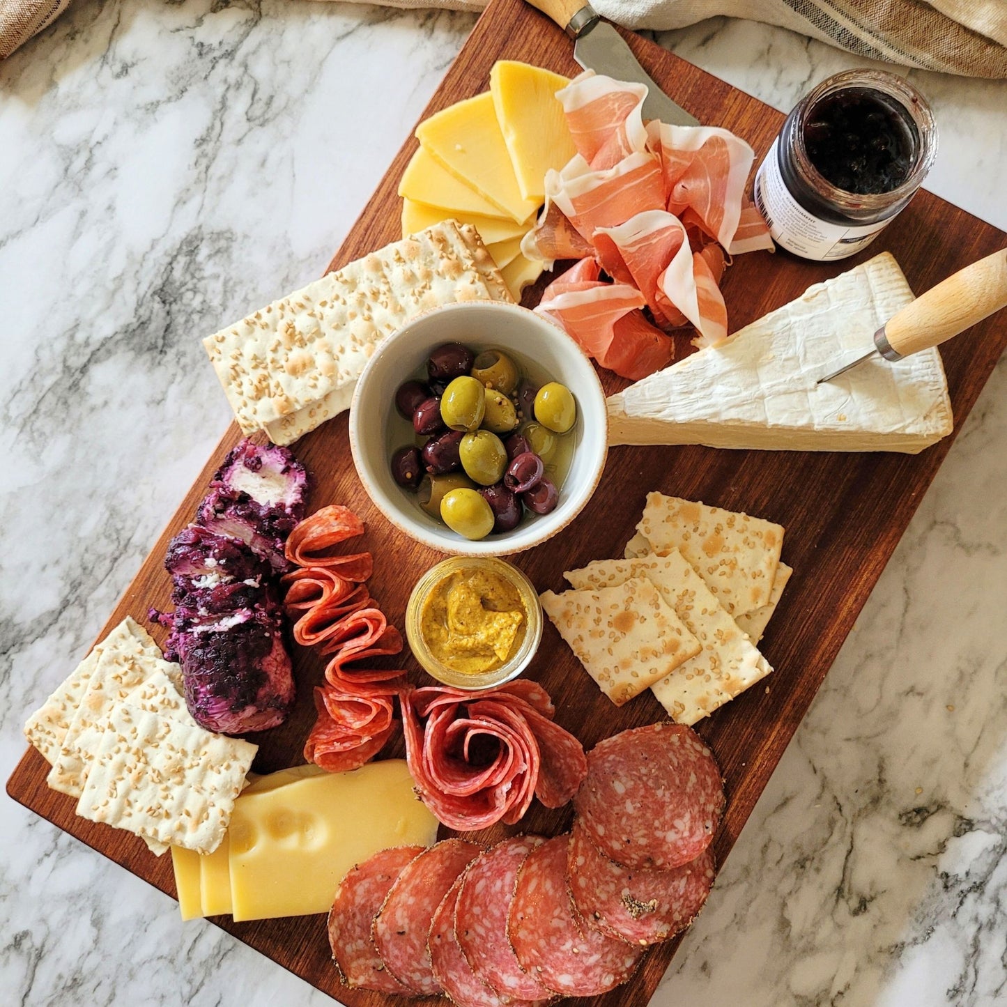 personalized cutting board used a a charcuterie board, personalized cutting board in a gift box