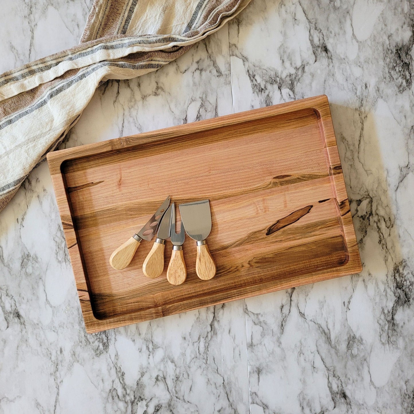 charcuterie board, personalized as a closing gift