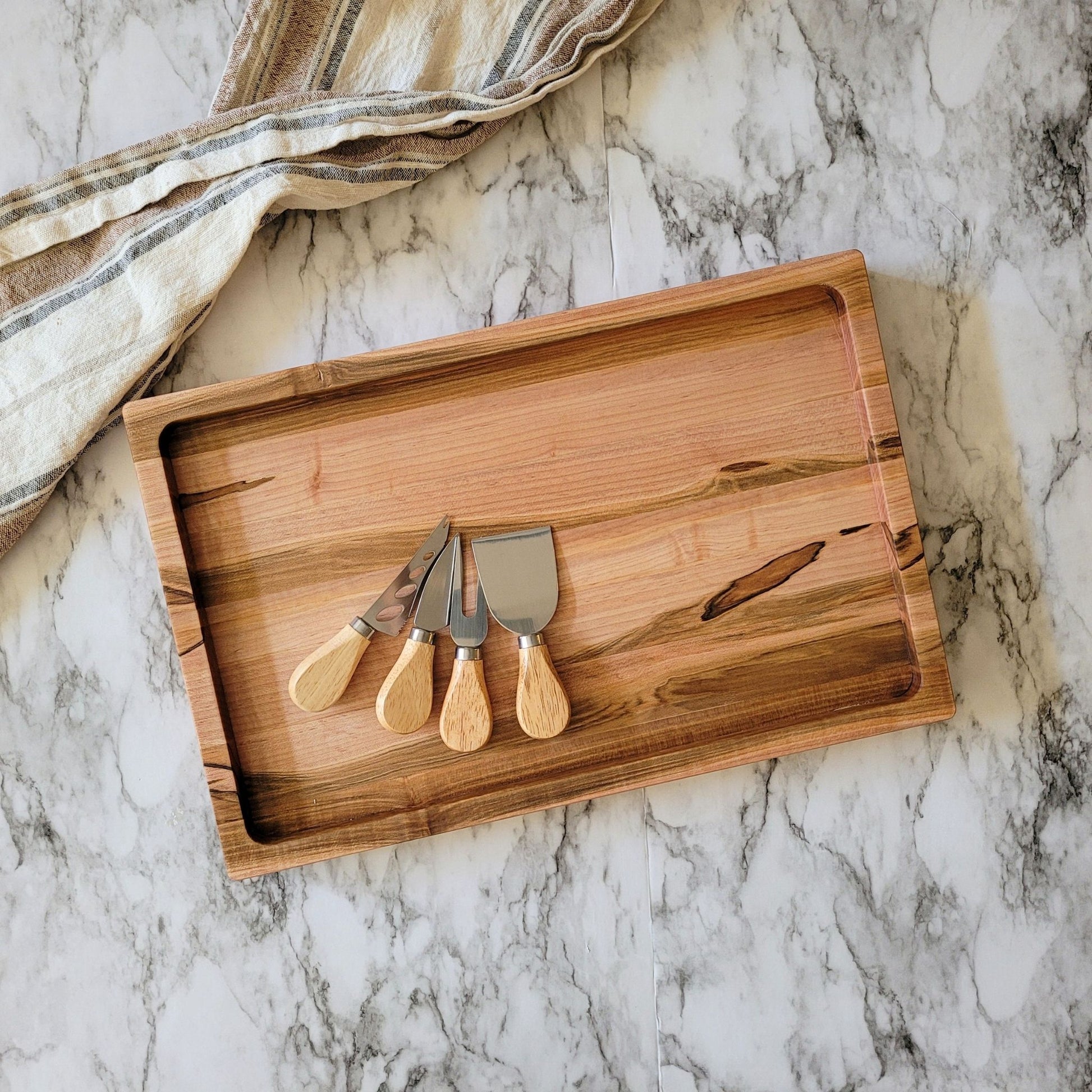 charcuterie board, personalized as a closing gift