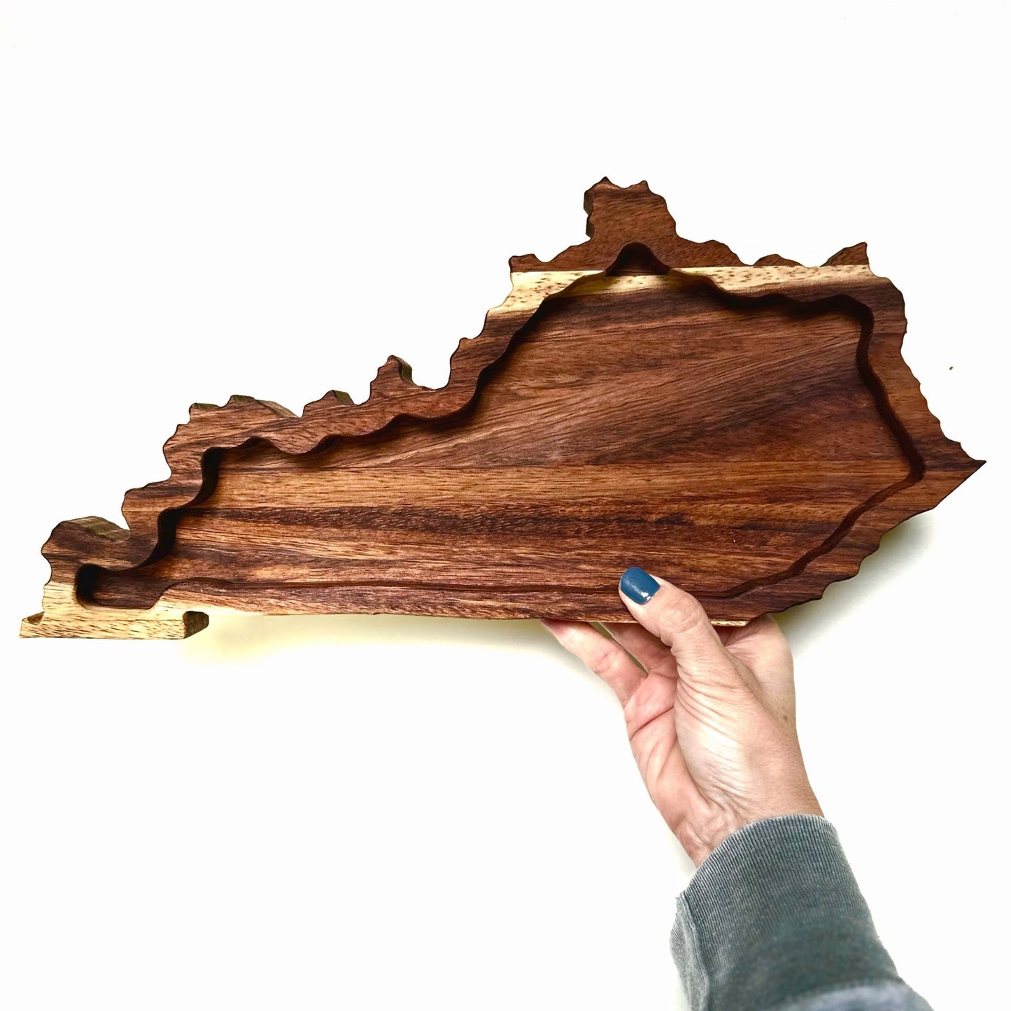 Kentucky shaped charcuterie board that can be used as a centerpiece decor