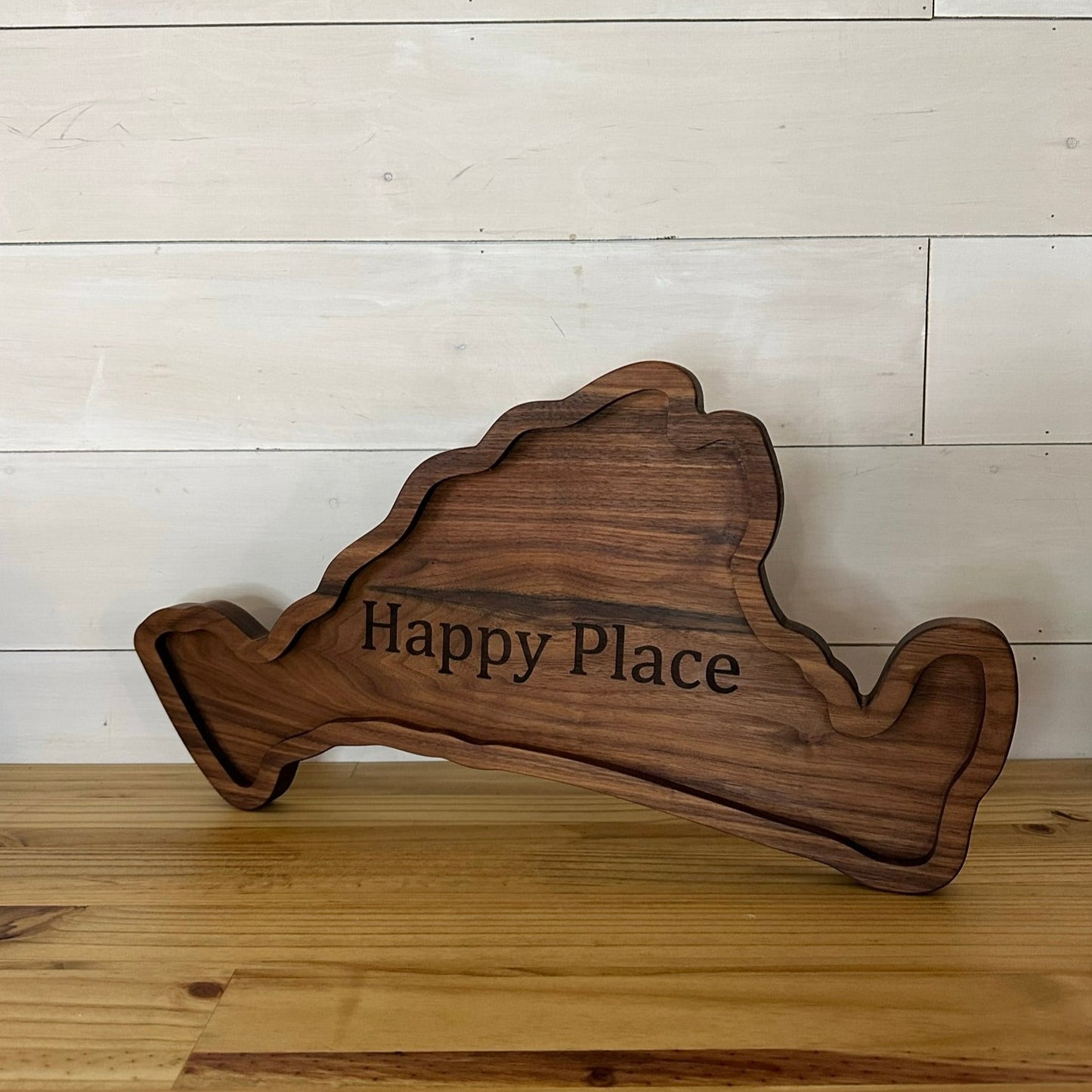 walnut marthas vineyard shaped board wit Happy Place engraved on it