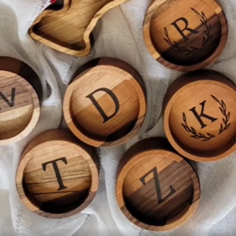 wooden wine coaster with intricate engraving