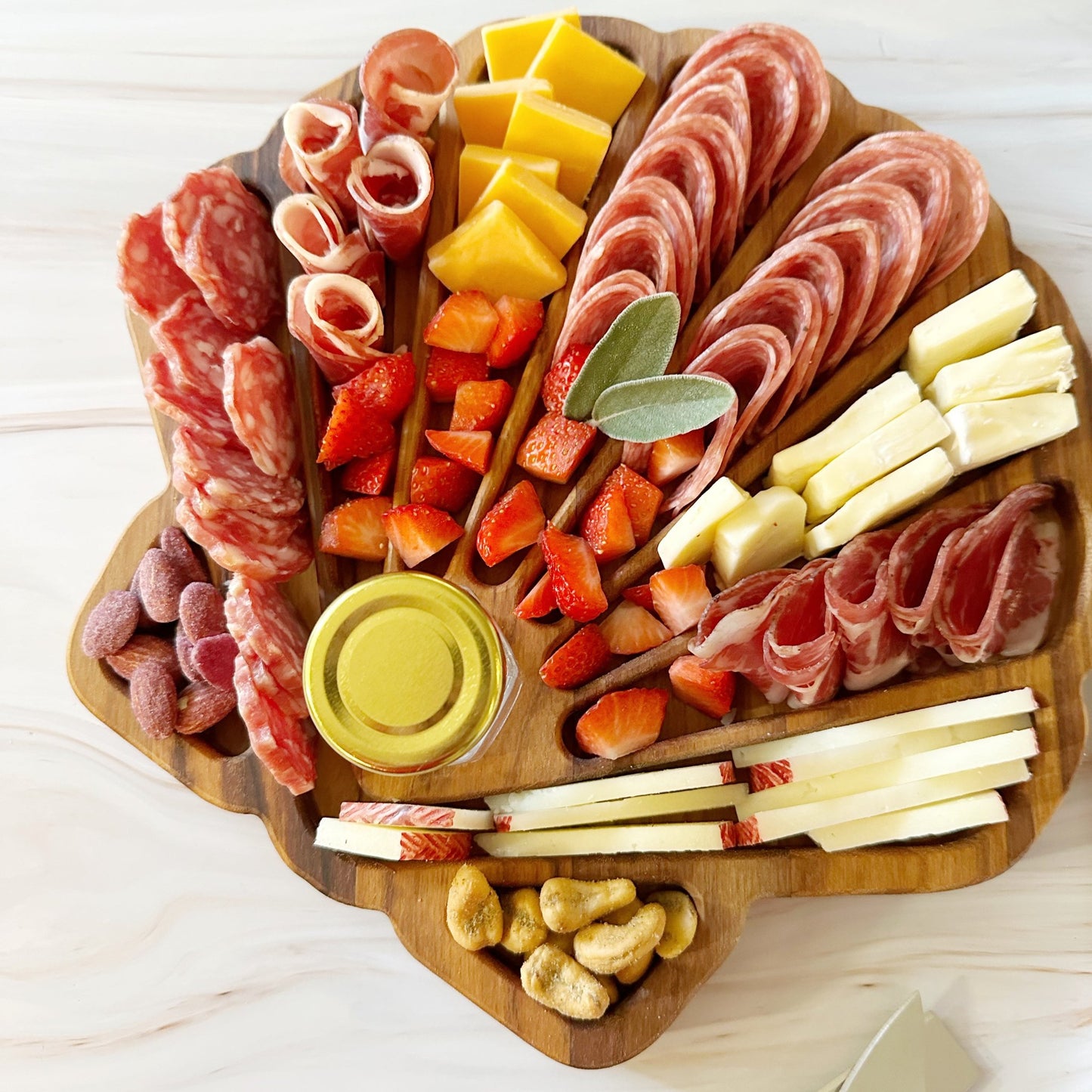 scallop shell charcuterie board, coastal charcuterie board, shell-shaped serving tray