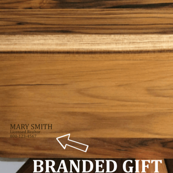 back of charcuterie board as a gift to new homeowner, branded with realtor information