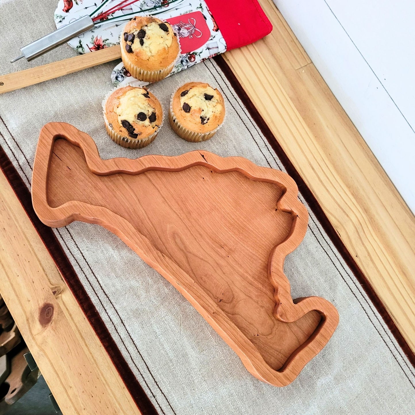 Martha's Vineyard-inspired charcuterie board, crafted from premium wood, with the words engraved on it, perfect for elegant gatherings