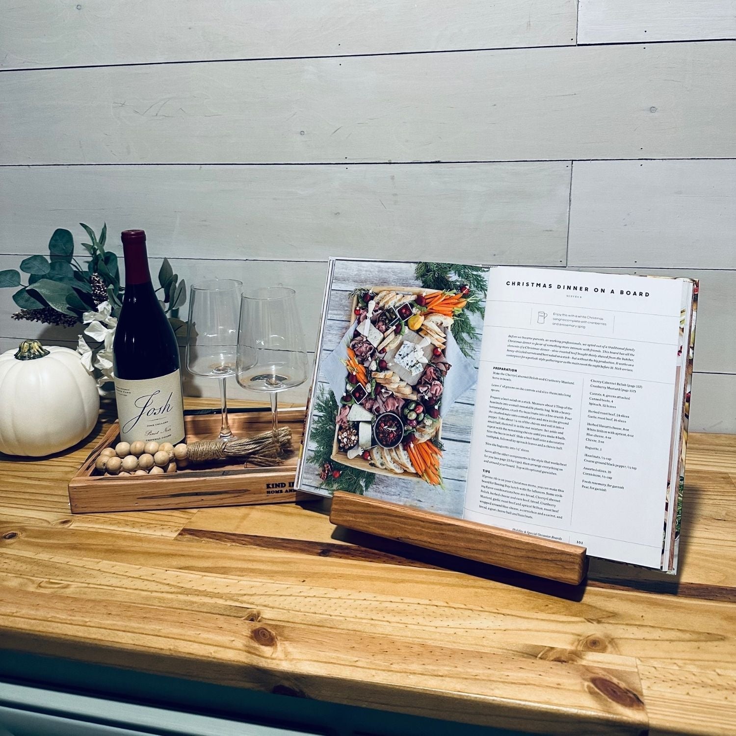 Cookbook holder displaying a recipe book in a stylish kitchen setting