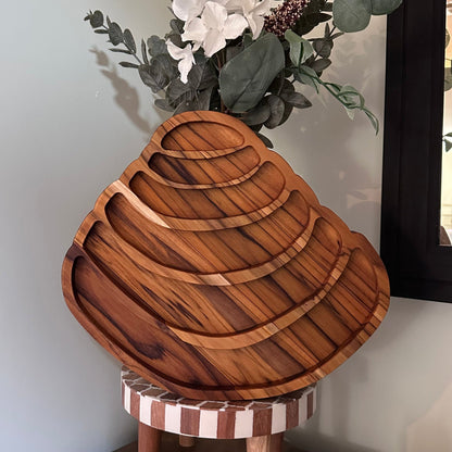 wooden serving tray shaped as shell