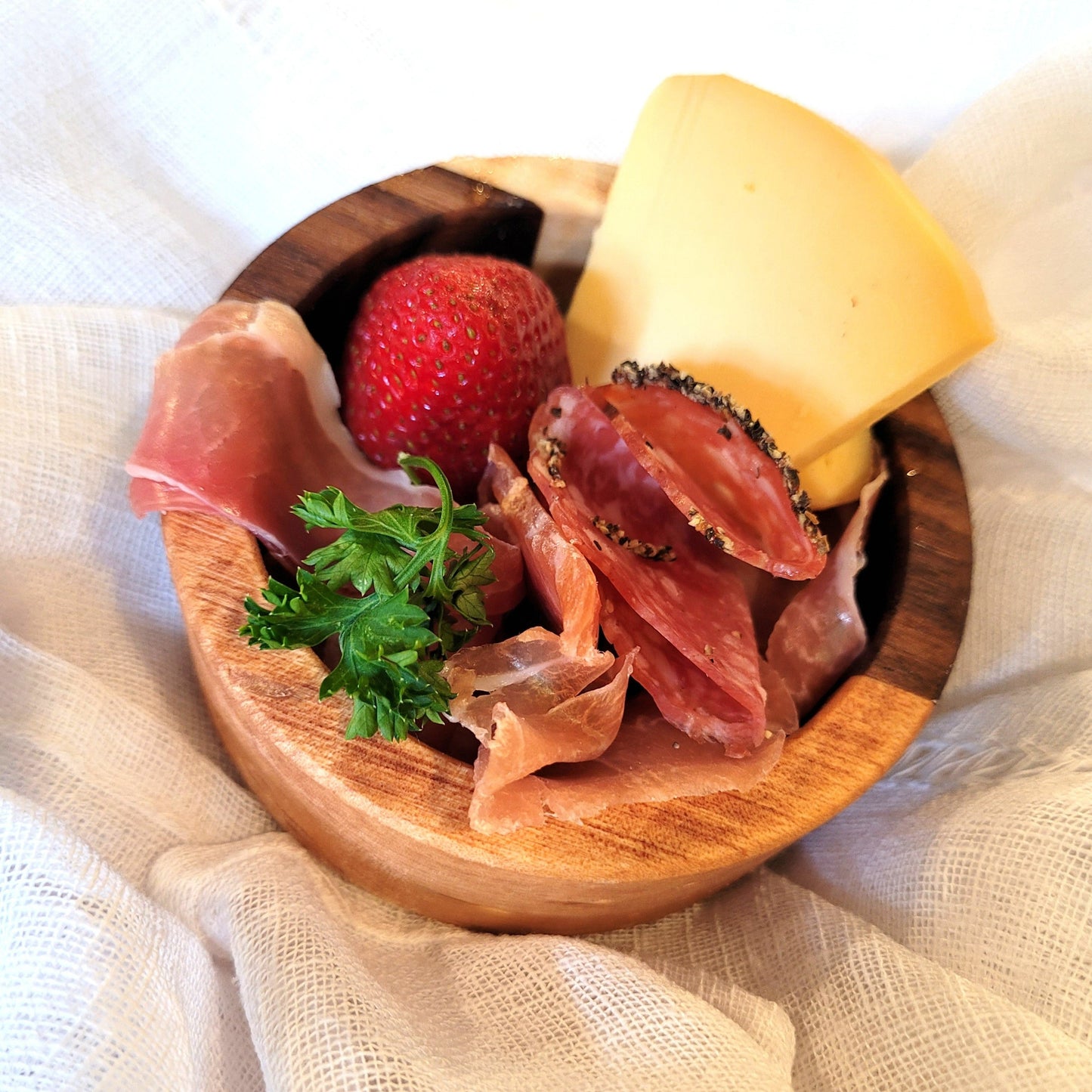 mini charcuterie bowl with cheese, meat and fruit