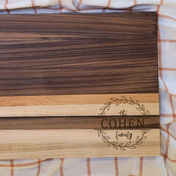 Premium mixed Wood Cutting Board personalized with a family name