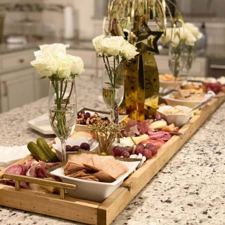 charcuterie platter doubling as a party centerpiece